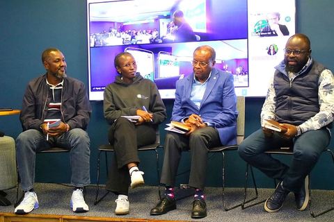 Four panellists seated in front of a video wall during the NASIP validation