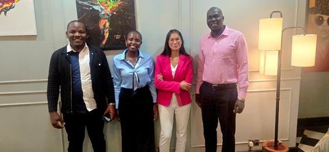 Four representatives of IAPA, GIZ and AAA Kenya standing together at a meeting in Nairobi