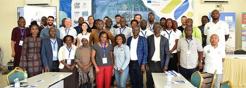 Delegates gathered for a group photo at the final PrAEctiCe agroecology conference in Kajjansi, Uganda